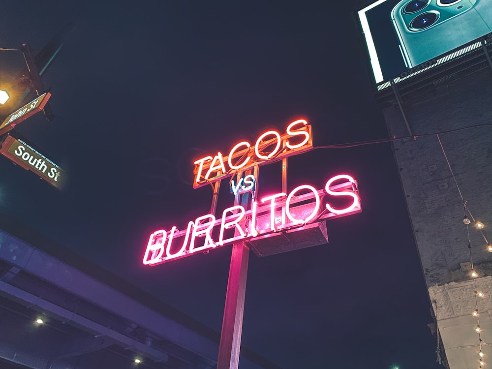 red and white open neon light signage