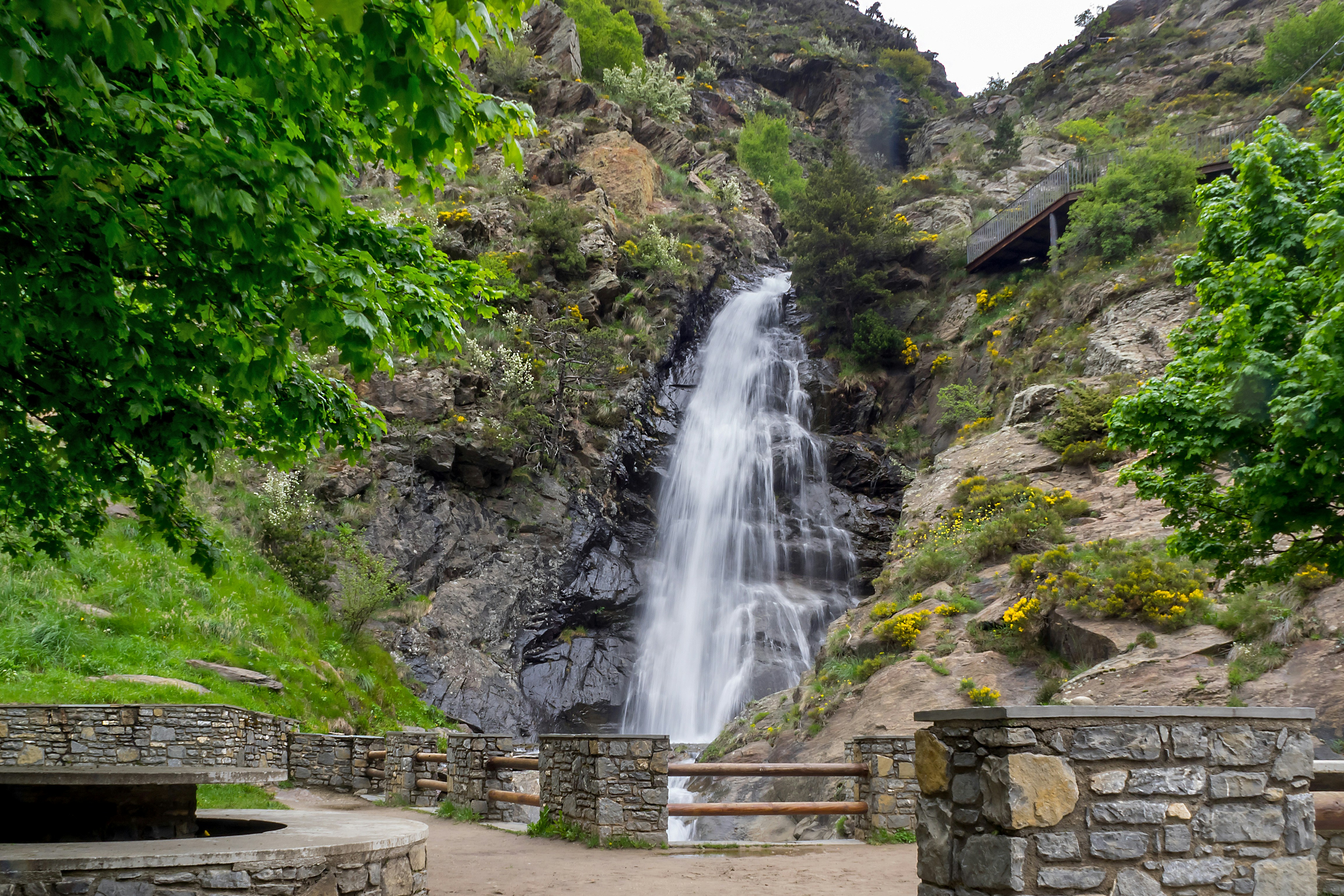 waterfalls in the middle of the forest