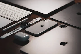 Latest electronic gadgets arranged neatly on a sleek table