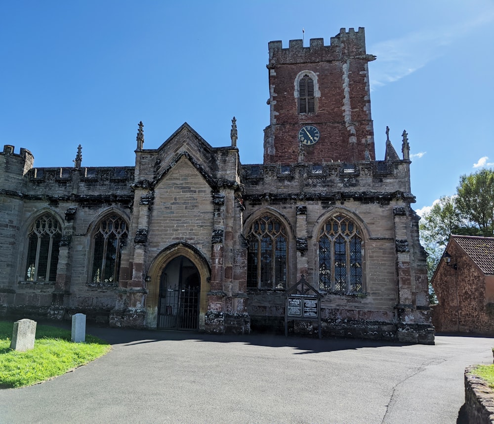 brown concrete church under blue sky during daytime