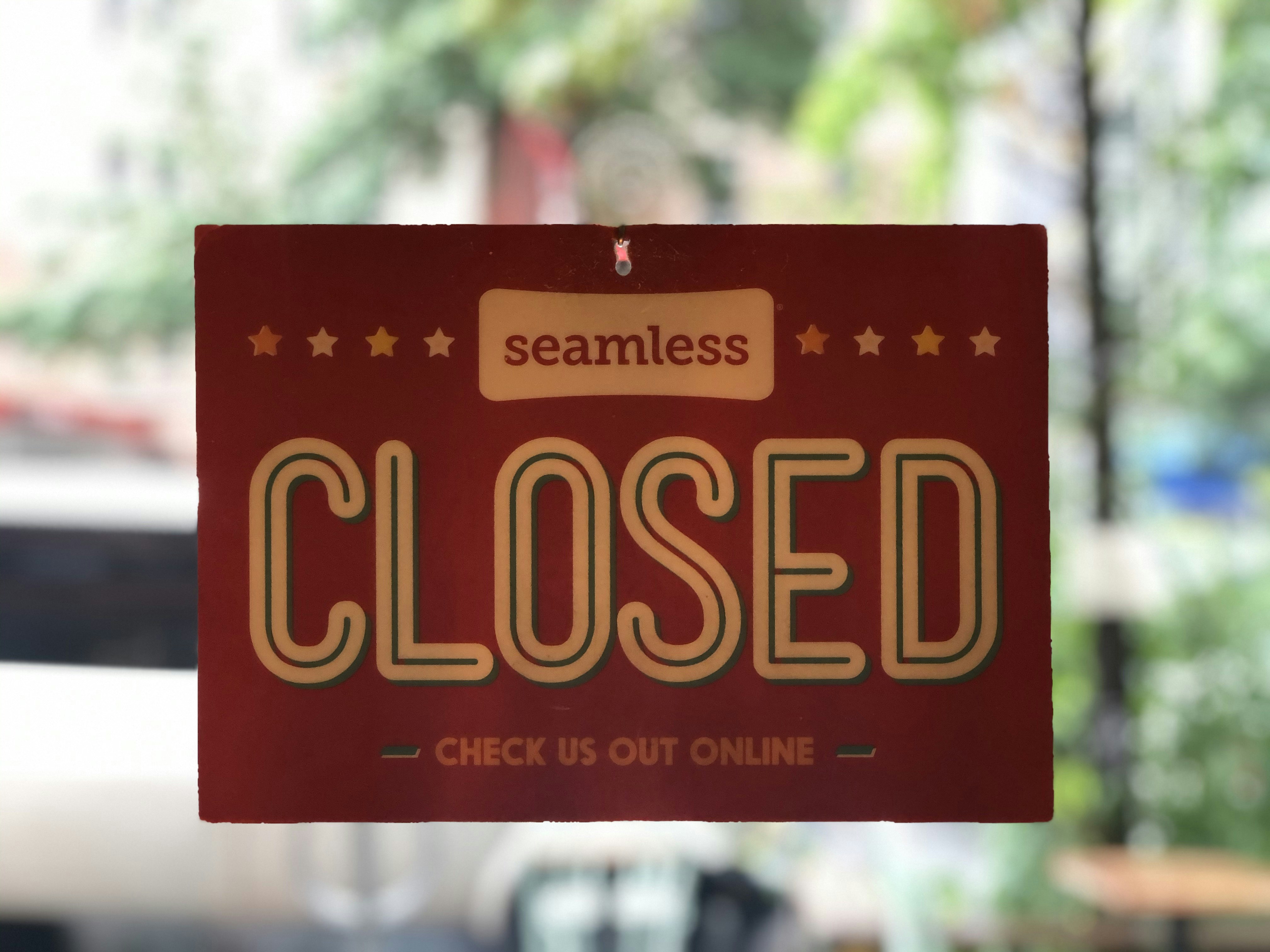 red and yellow no smoking sign