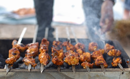grilled meat on charcoal grill