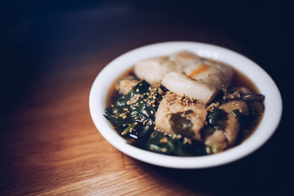 white ceramic bowl with soup