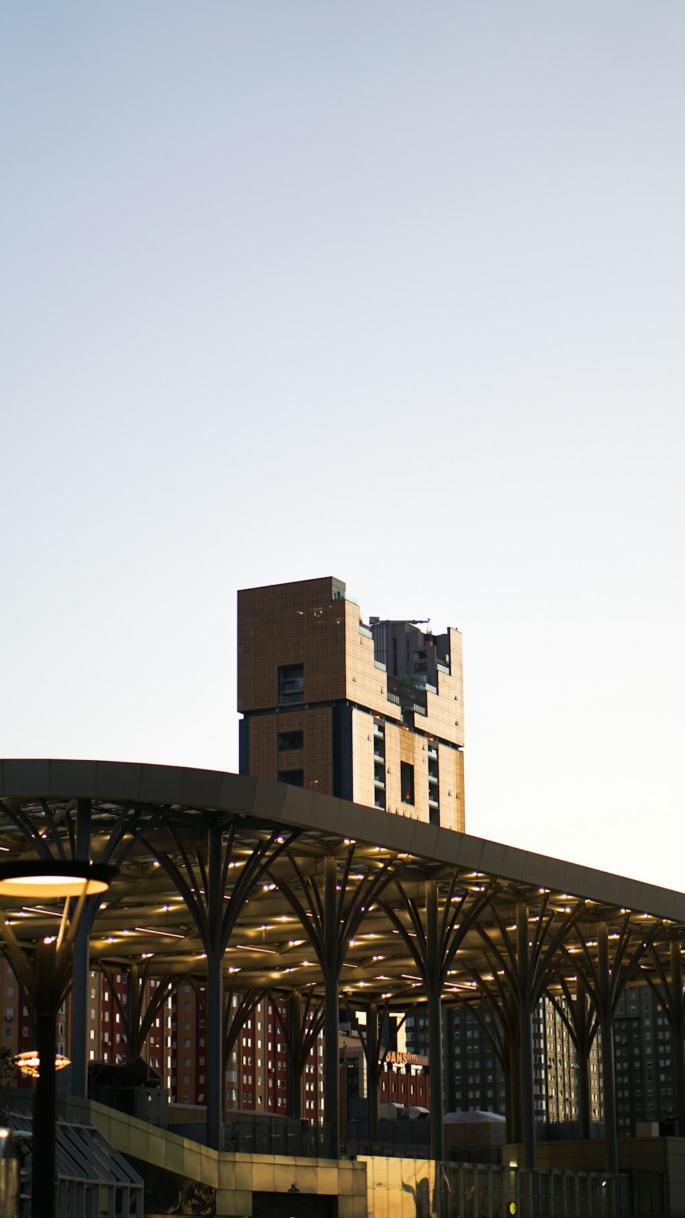 brown concrete building under white sky during daytime