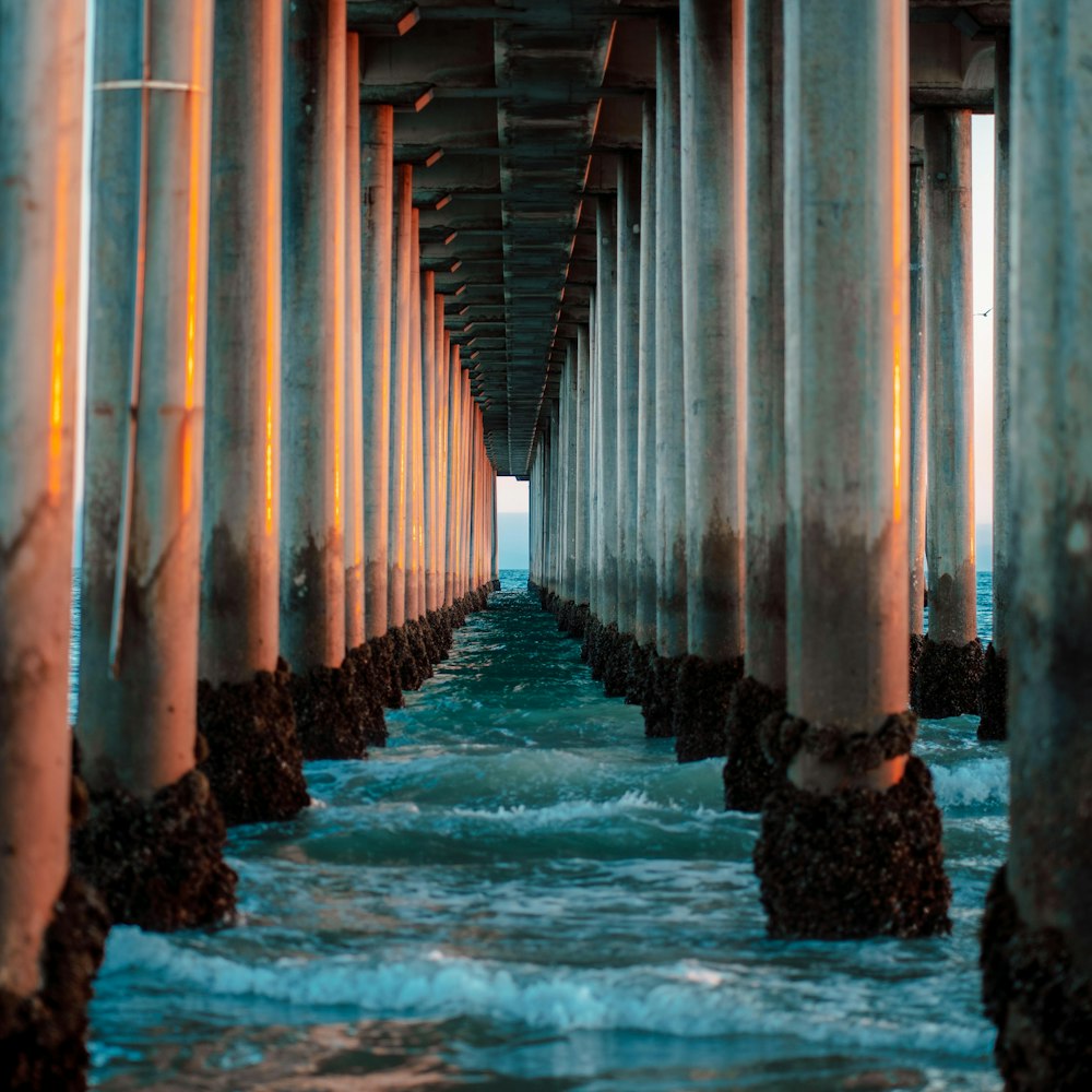 brown wooden bridge over water