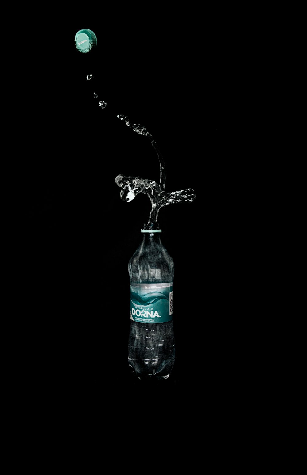 clear plastic bottle with water