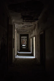 white and gray concrete hallway