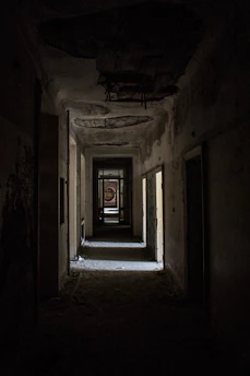 white and gray concrete hallway