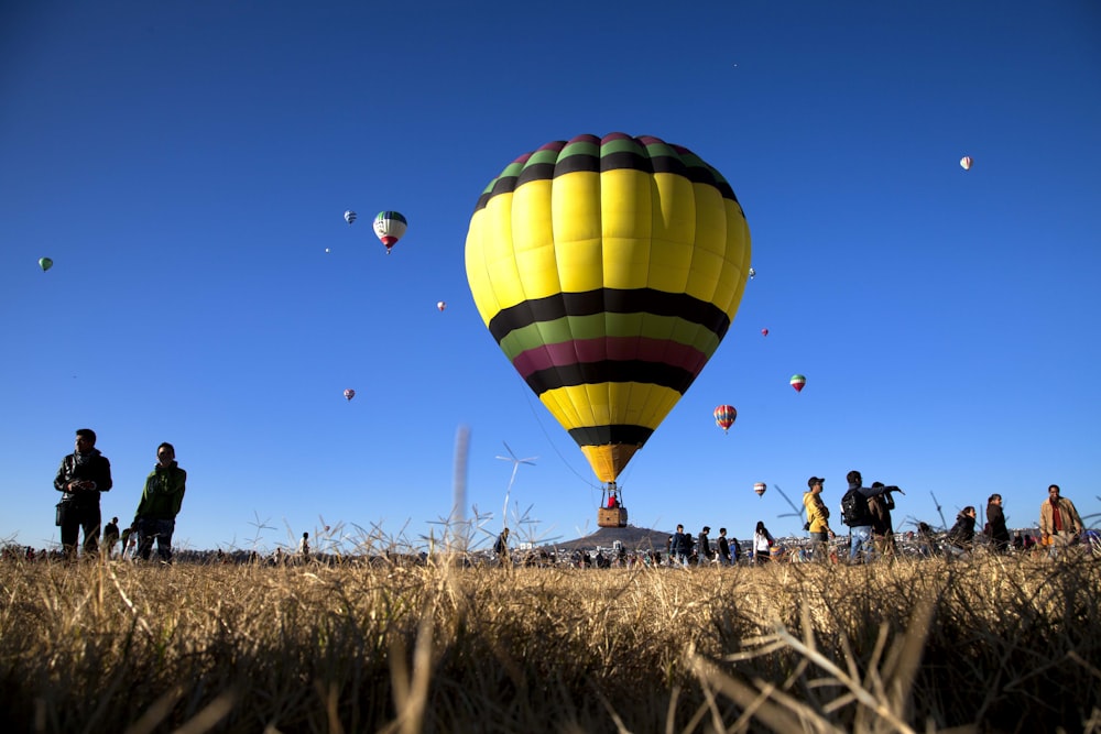 yellow green and blue hot air balloons