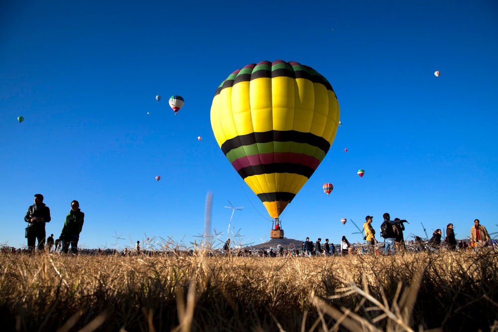 yellow green and blue hot air balloons