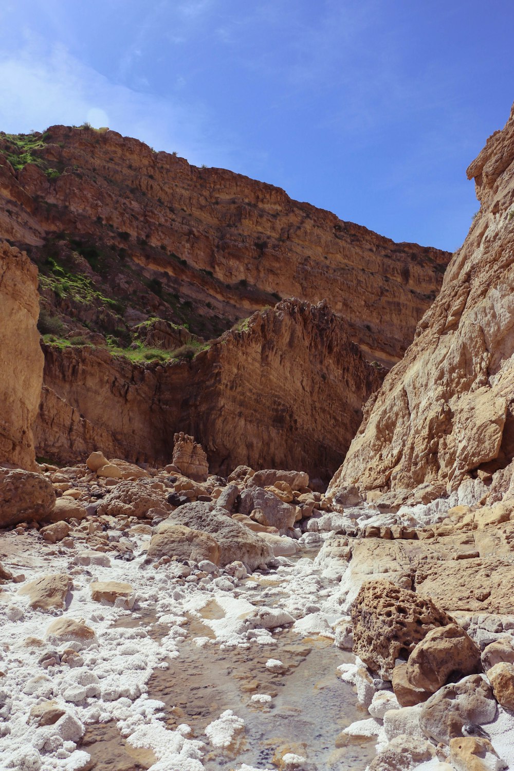 brown rocky mountain under blue sky during daytime