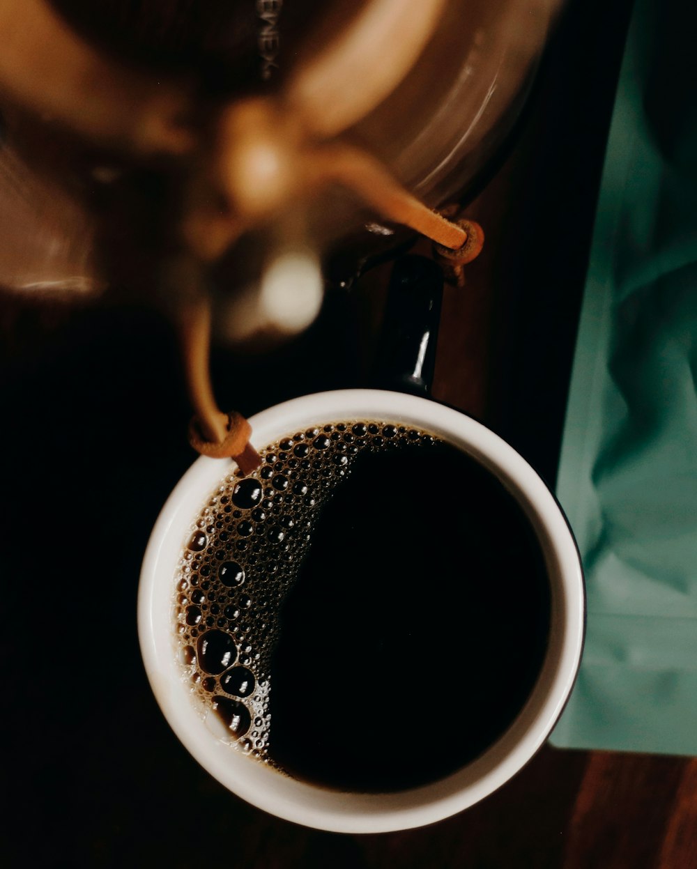 white ceramic mug with coffee