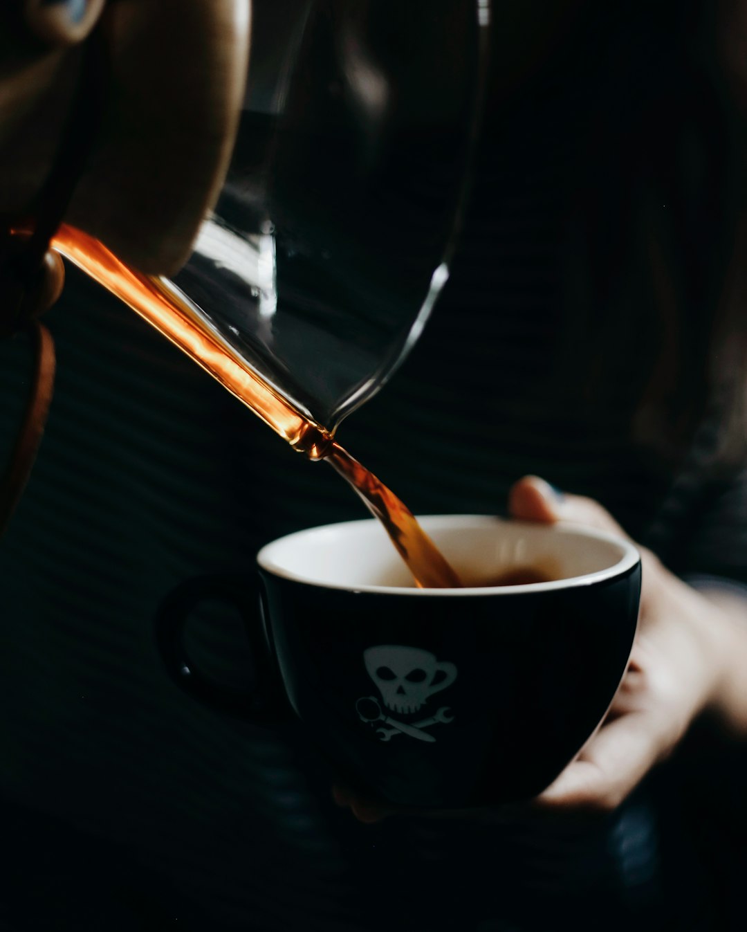 black and white ceramic cup with coffee