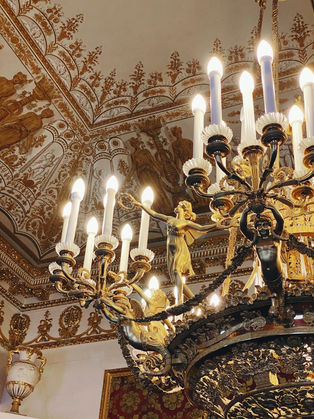 gold and white uplight chandelier