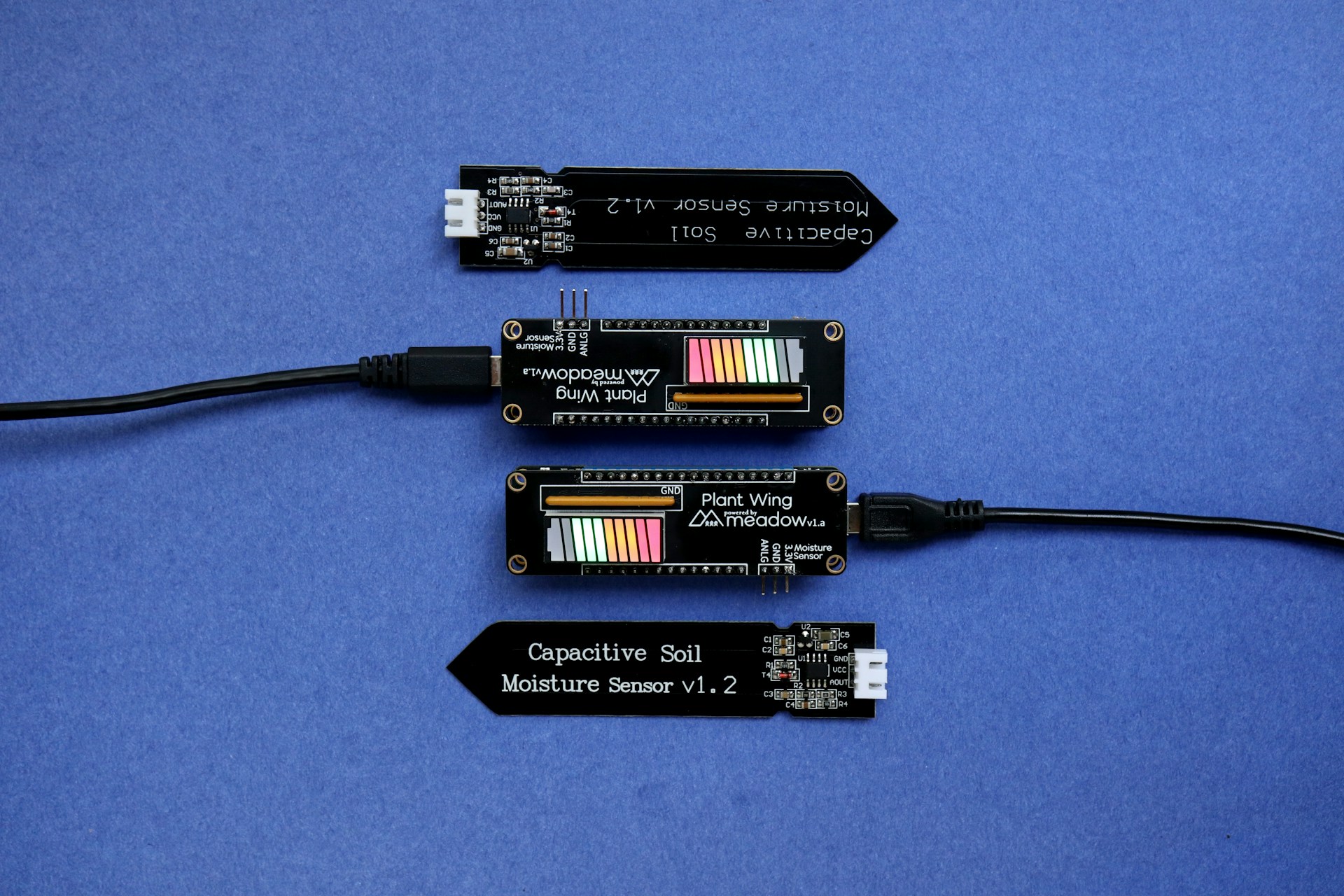 A close-up of advanced sensors placed in soil, monitoring moisture levels and nutrient content.
