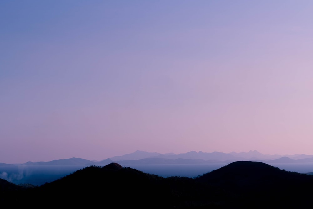 silhouette of mountains during daytime