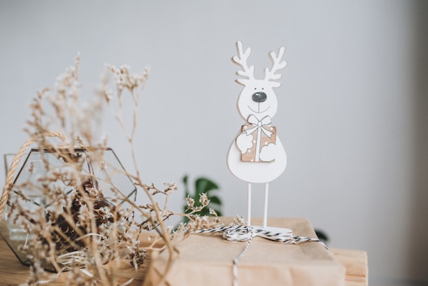 white rabbit on tree branch