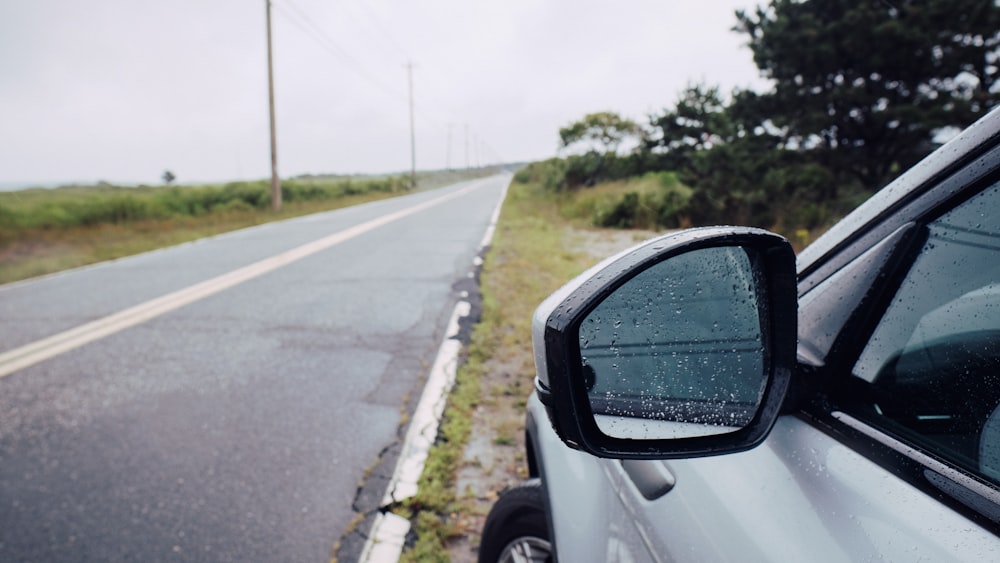 white car on road during daytime