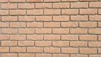 Image showing a completed masonry wall with clean lines and fresh mortar.