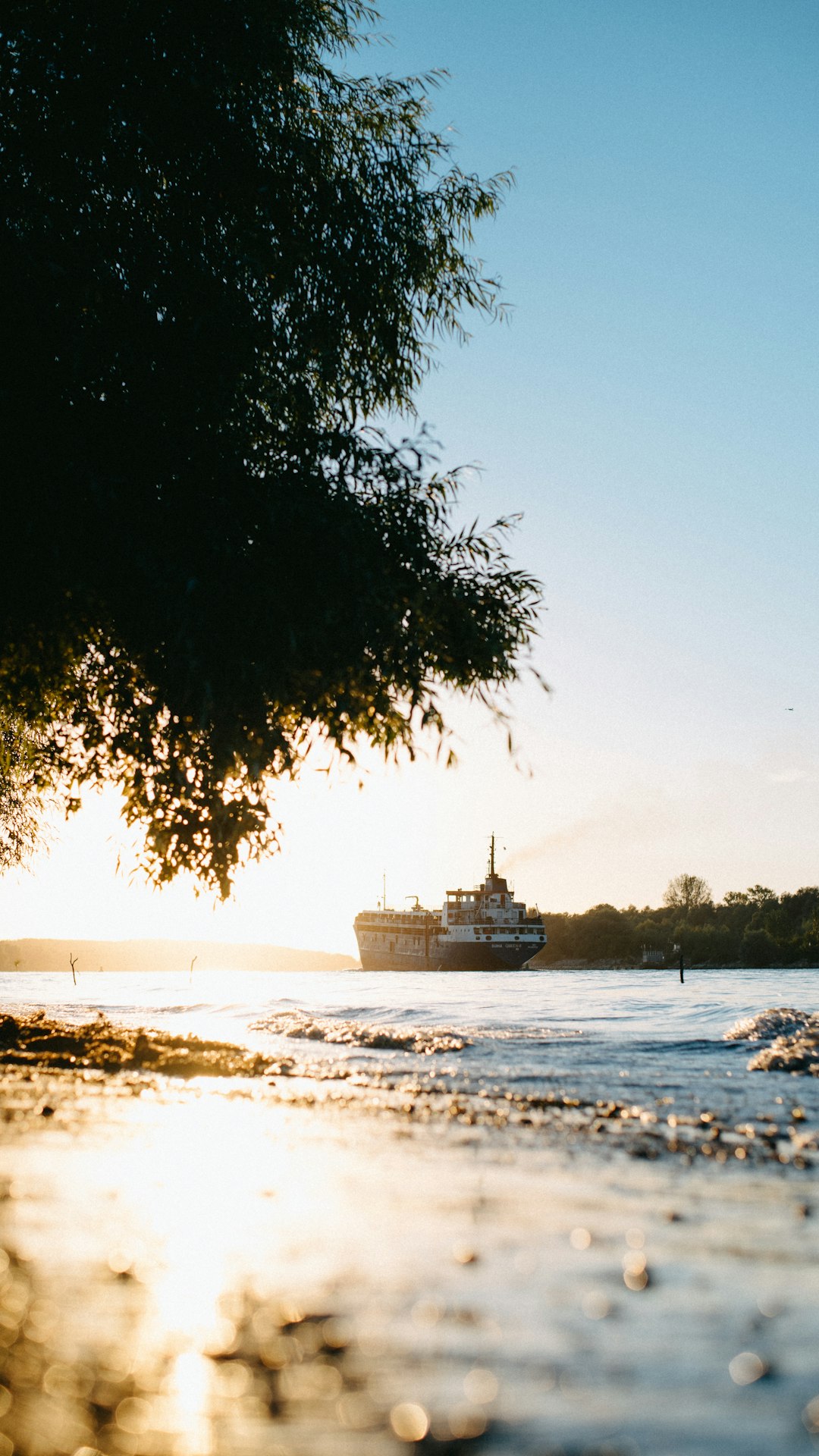 white ship on sea during daytime