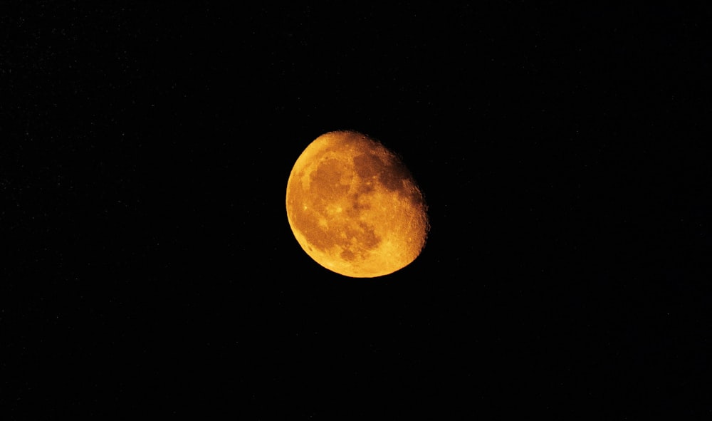 full moon in dark night sky