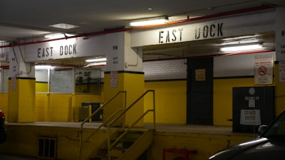 Close-up of a heavy-duty industrial loading dock with yellow safety markings.