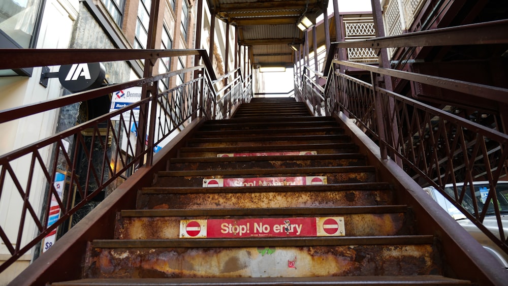 red and brown wooden stairs