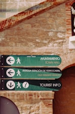 green and black wooden signage