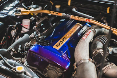 Side view of a Nissan Patrol with a BMW engine installed using an adapter plate.