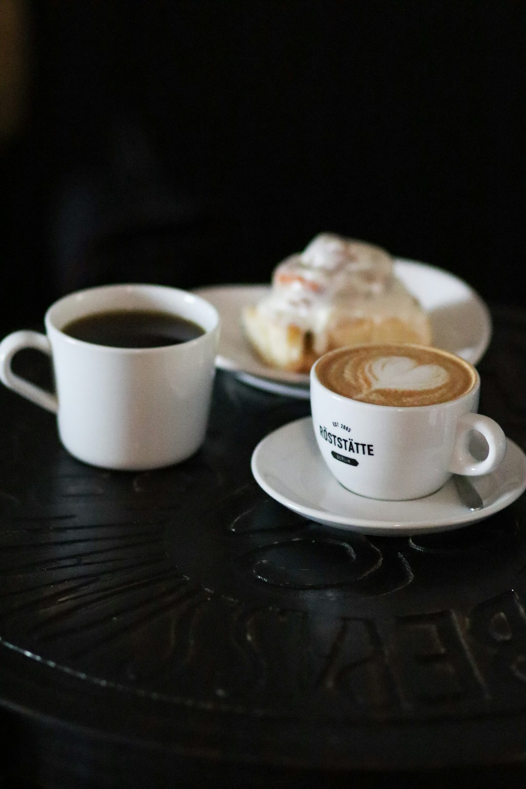 white ceramic cup on white ceramic saucer