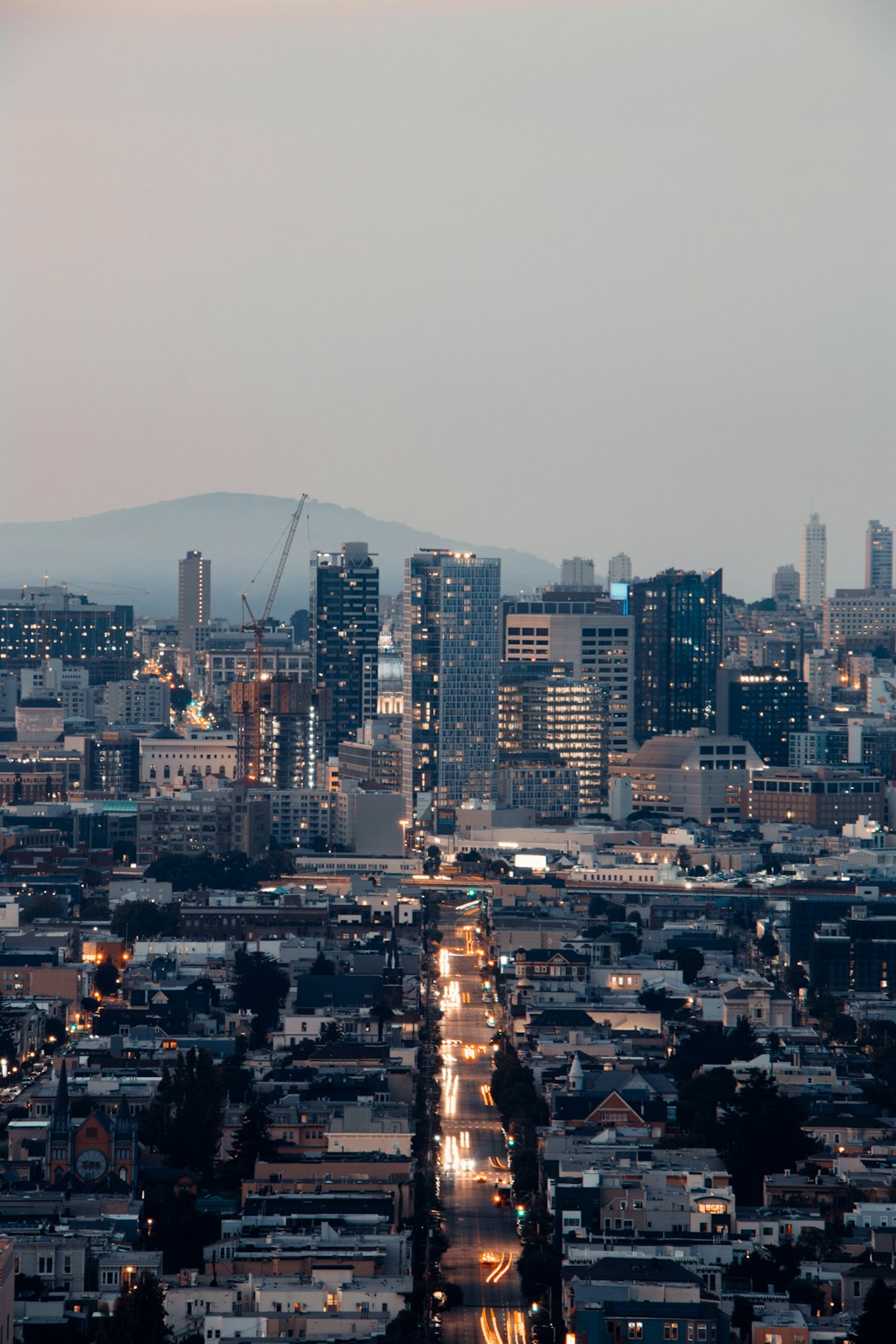 city with high rise buildings during night time