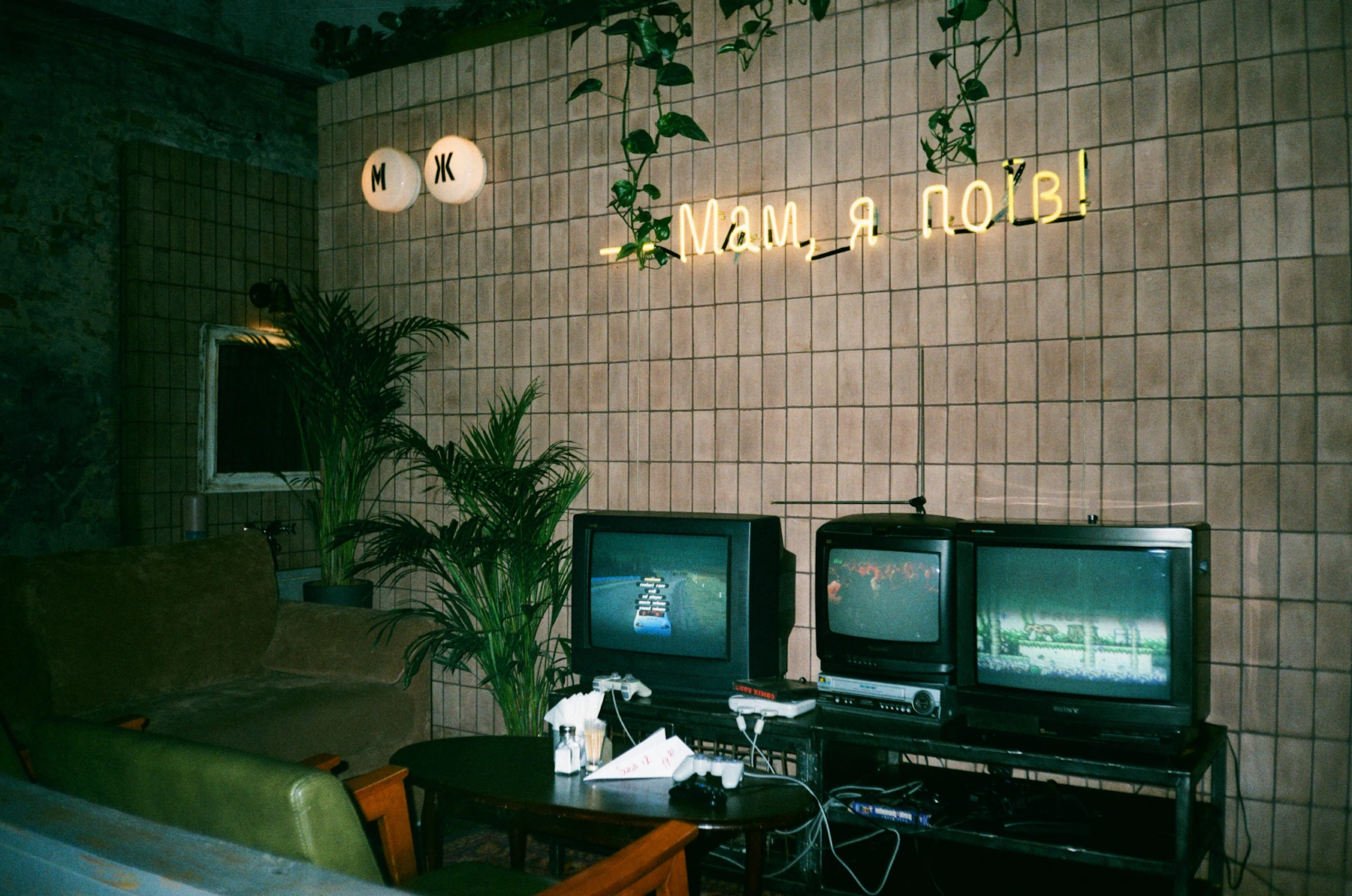 Black CRT TV on a brown wooden table
