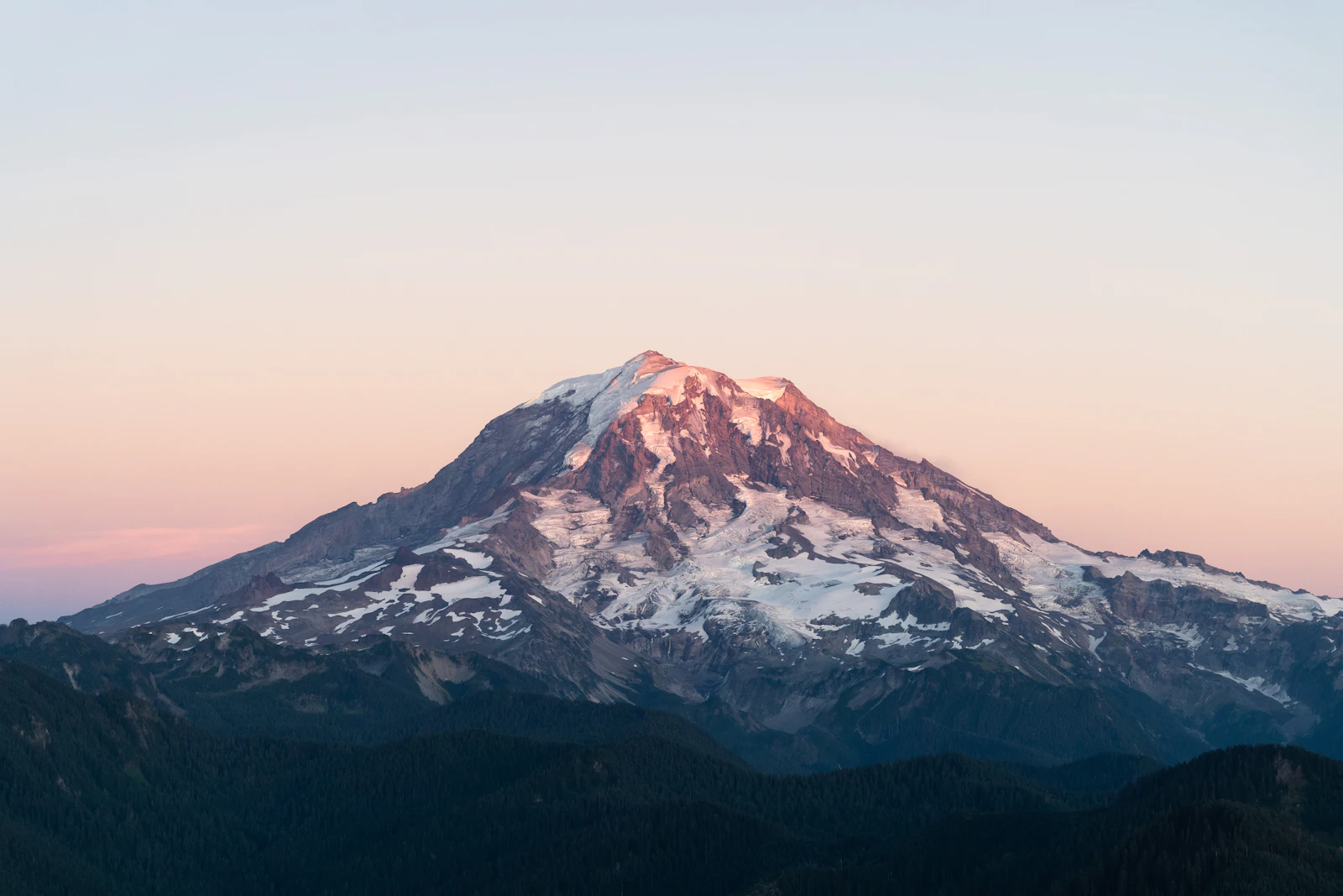 Snow-covered Mount Rainier under a clear blue sky