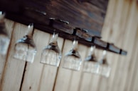 Elegant wine glass rack made from premium wood.