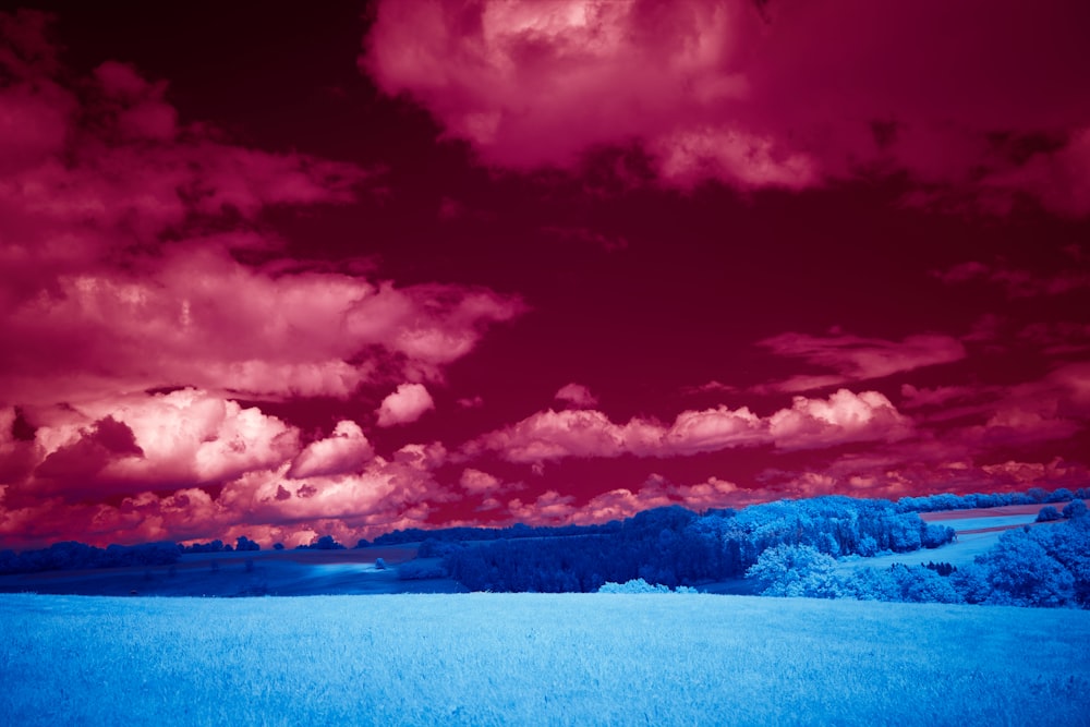 blue sea under blue sky and white clouds during daytime