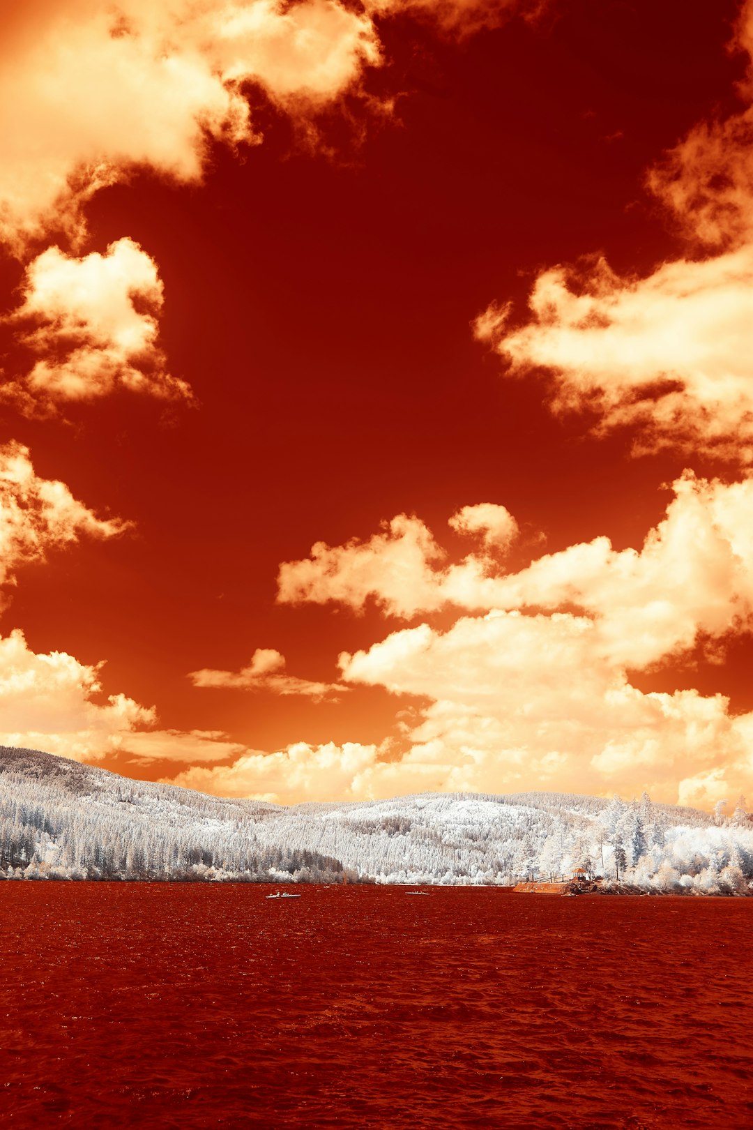 white clouds over snow covered mountains