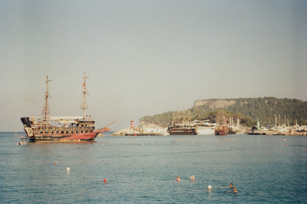 brown ship on sea during daytime