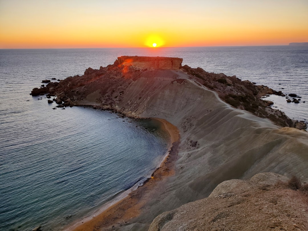 Coastal and oceanic landforms photo spot Għajn Tuffieħa Sanap Cliffs