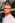 man in white crew neck shirt wearing black framed eyeglasses