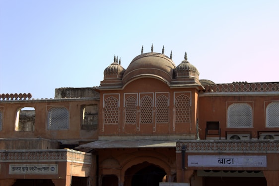 Front view of Birla Dharamshala showing neat rooms and a welcoming entrance near Ayodhya Junction Road.