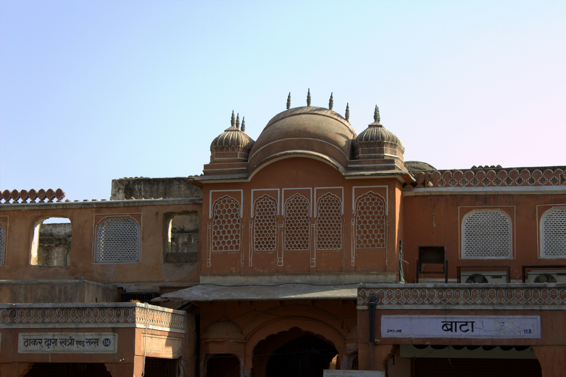 woman wearing yellow long-sleeved dress under white clouds and blue sky during daytime