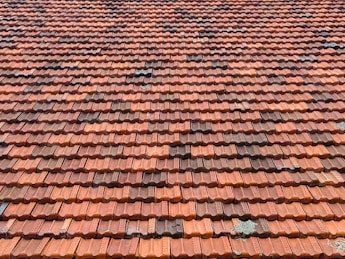 brown roof tiles in close up photography