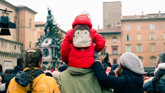Sinterklaas arriving at a festive crowd in the Alphonse De Hollainhof square.