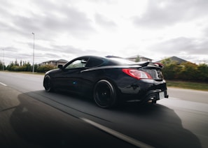 black porsche 911 on road during daytime