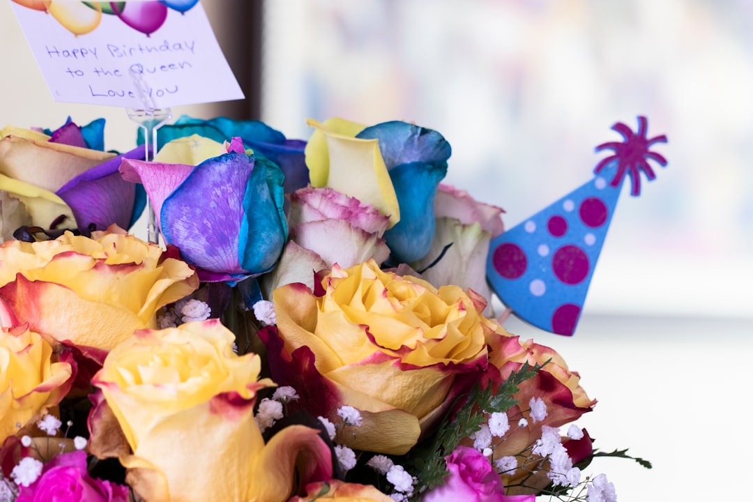 yellow blue and purple flower bouquet,
