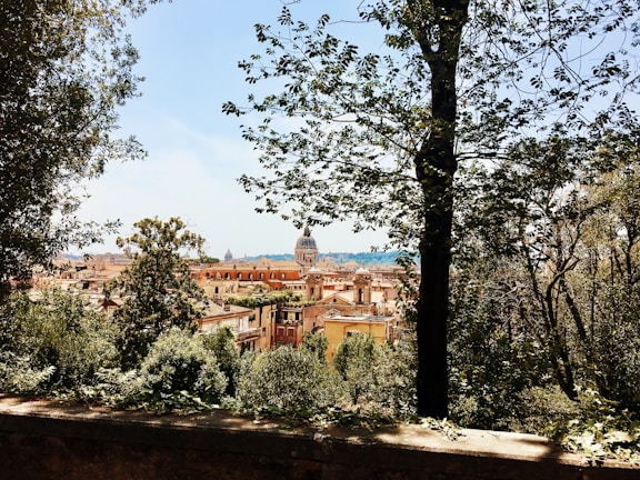 A majestic view of Aleppo Citadel bathed in green hues under a clear sky