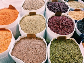 green and brown round food in white plastic containers