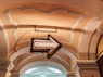 a casino sign hanging from the ceiling of a building