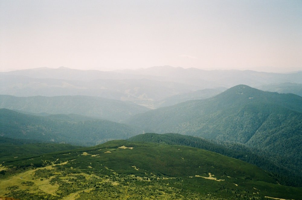 green mountains under white sky during daytime