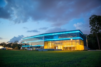 white and blue building under cloudy sky during daytime